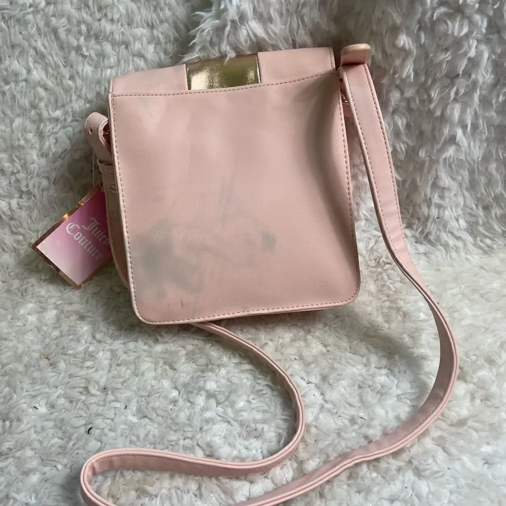 Juicy Couture pink and gold synthetic leather crossbody bag.